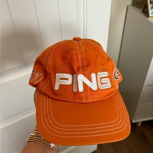 PING orange golf hat